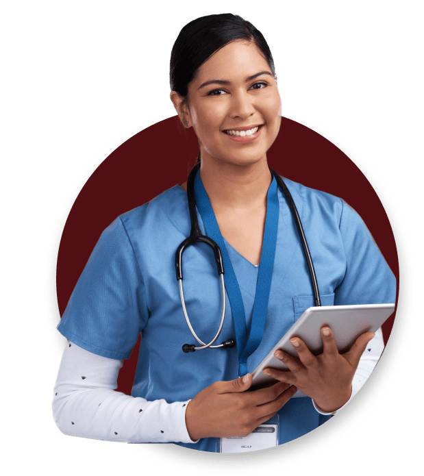 Smiling nurse in scrubs with a stethoscope around her neck